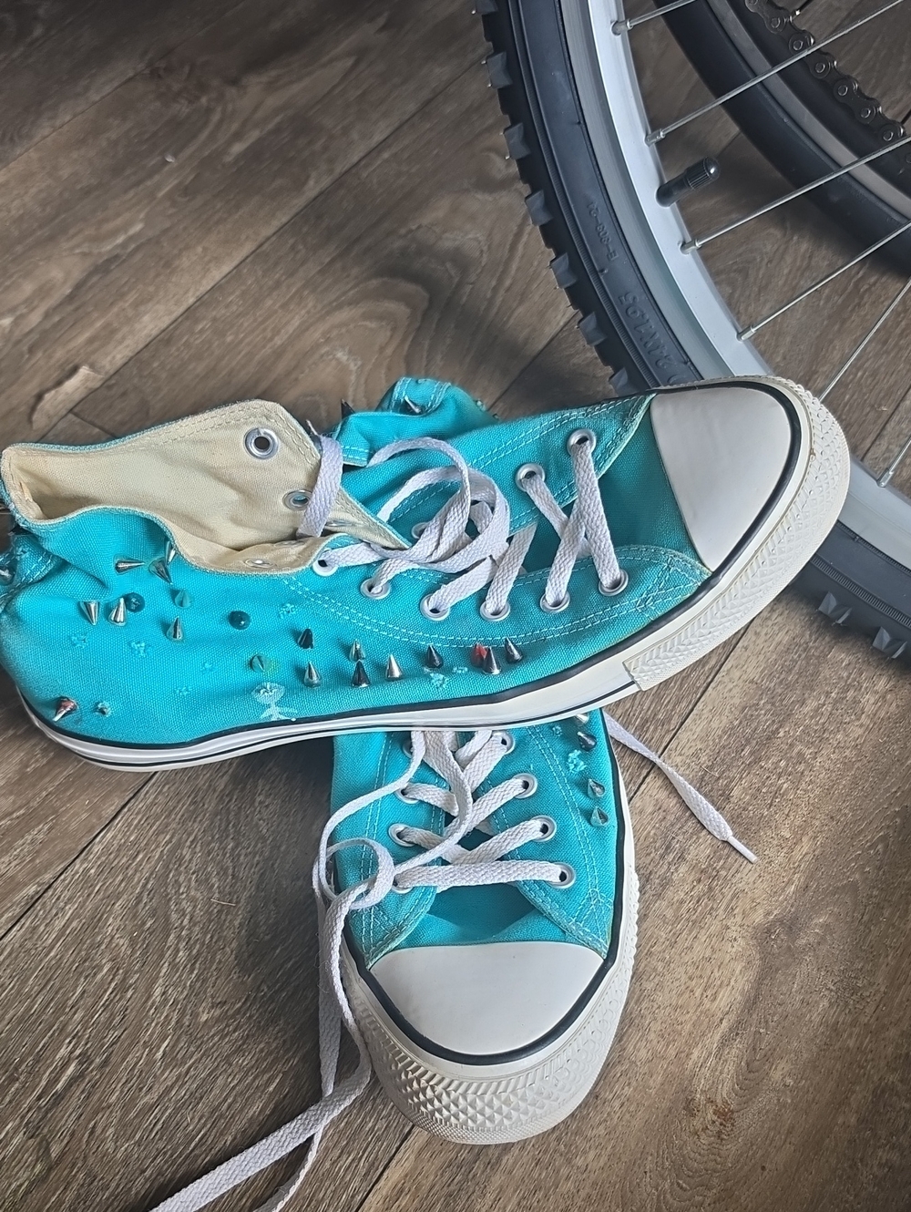 Converse Turquoise High-Top Sneakers with White Soles and Silver Studs